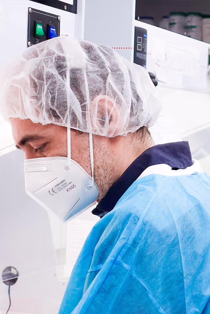 Pharmacists preparing custom medications at Aurora Compounding Pharmacy